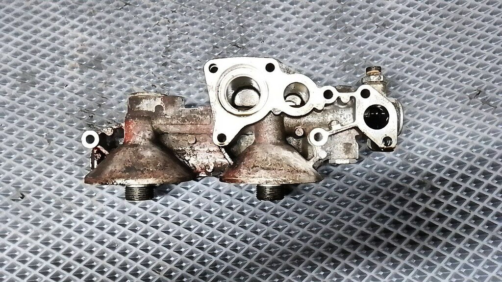 Корпус масляного фильтра двойной с теплообменником б/у 