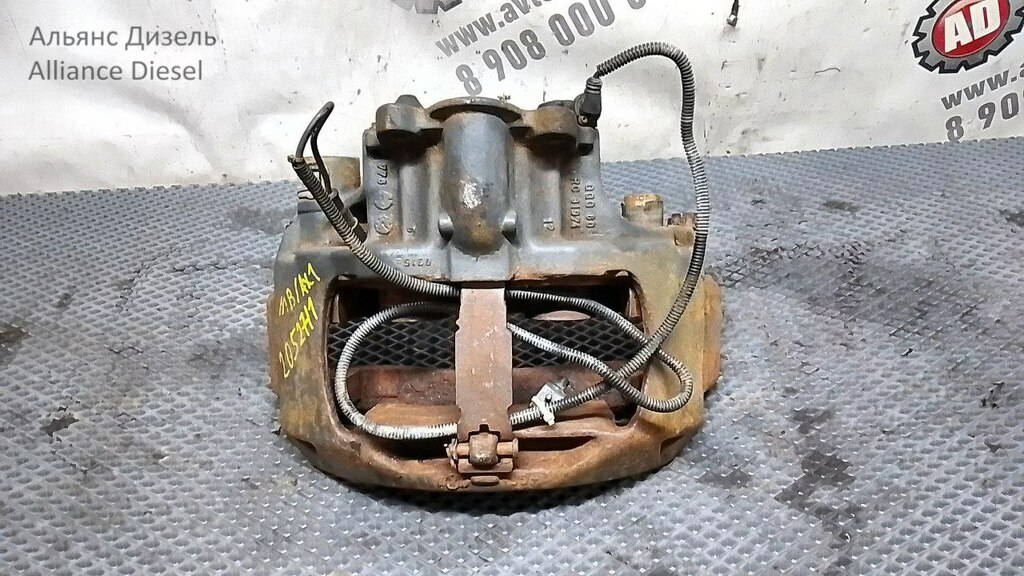 Суппорт тормозной левый б/у