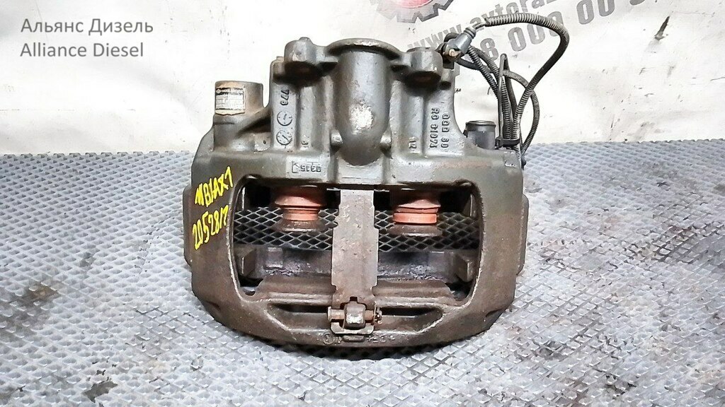 Суппорт тормозной левый б/у