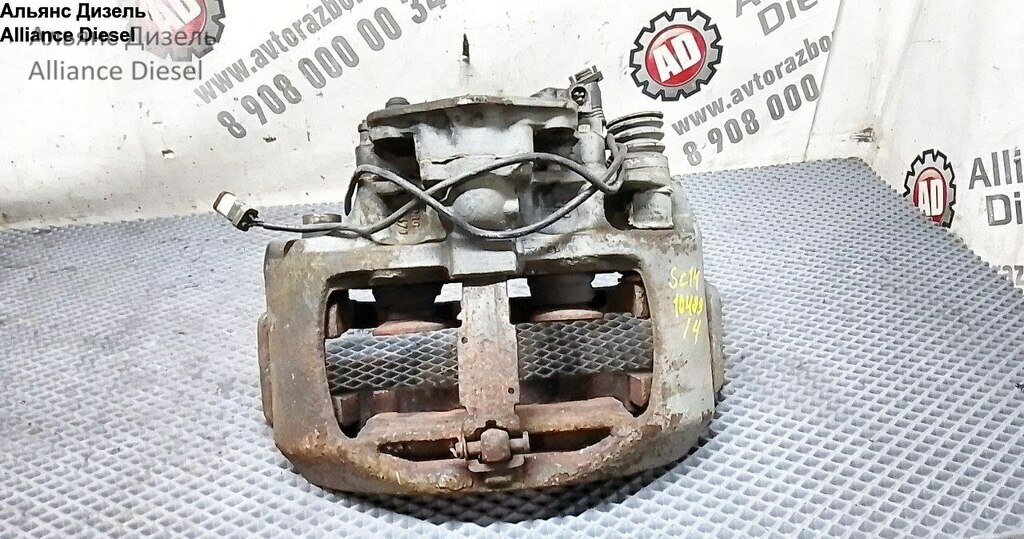 Суппорт тормозной задний левый б/у