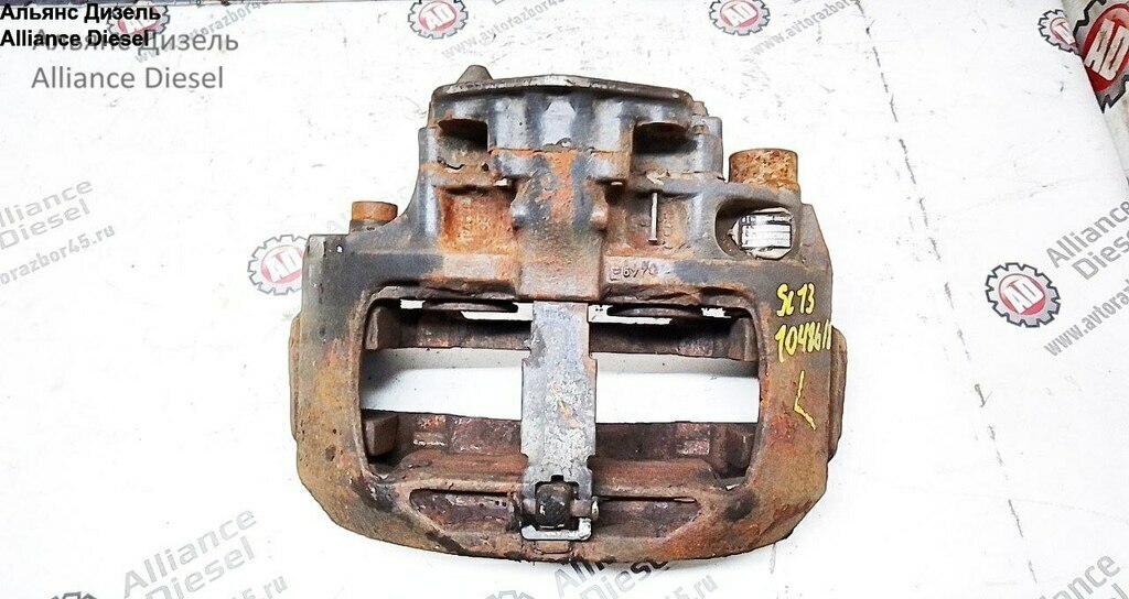 Суппорт тормозной передний левый б/у