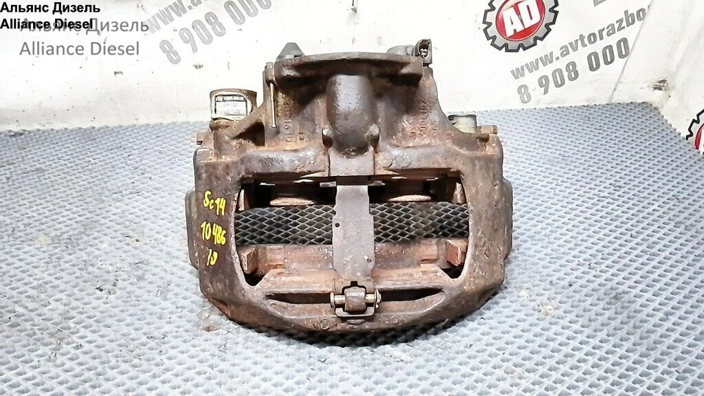 Суппорт тормозной передний левый б/у